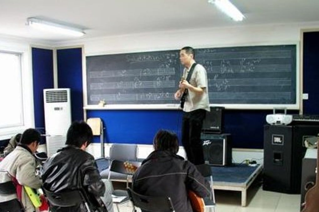 Students attend a class at China’s Beijing Midi School of Music. Photo: Mask9.com