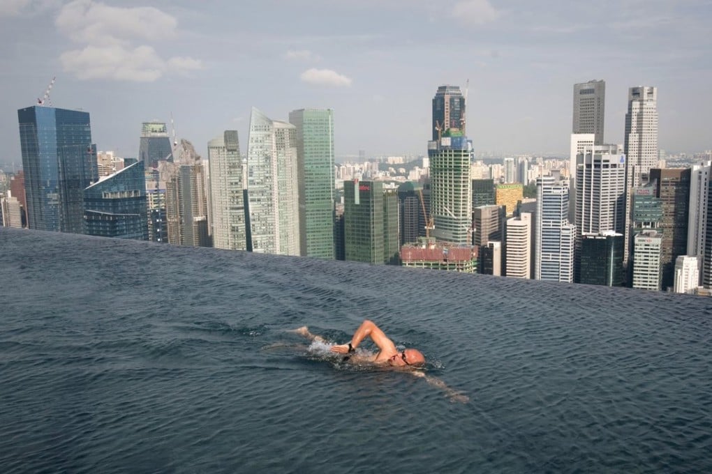 Singapore’s central bank warns sub-par growth in Asia could pressure profits and debt servicing capacity of businesses, leaving banks exposed to risks of bad loans. Photo: Reuters