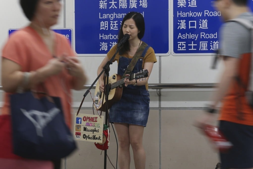 Busker Ophei Kwok performs in an underpass in Tsim Sha Tsui. Photo: K.Y. Cheng