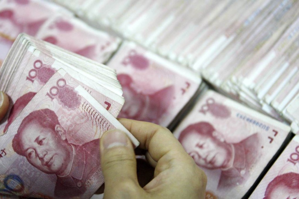 Offshore yuan fell more than 200 basis points to 6.45 against the US dollar. Photo: AFP