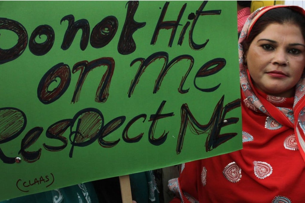 A Pakistani woman takes part in a rally in Lahore to mark the International Day for the Elimination of Violence against Women last Wednesday. Photo: AP