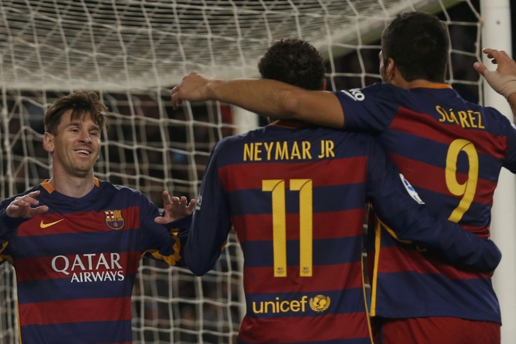 Lionel Messi celebrates with Suarez and Neymar. Photo: Reuters