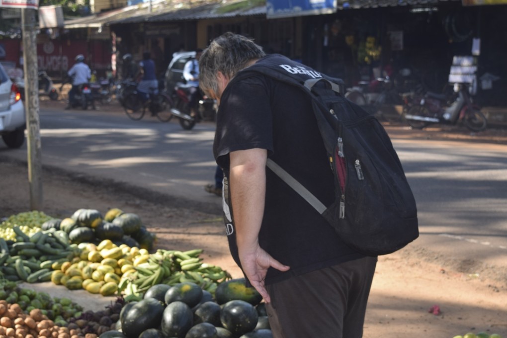 Mischa Moselle at a roadside fruit and vegetable stall in Calicut, India.