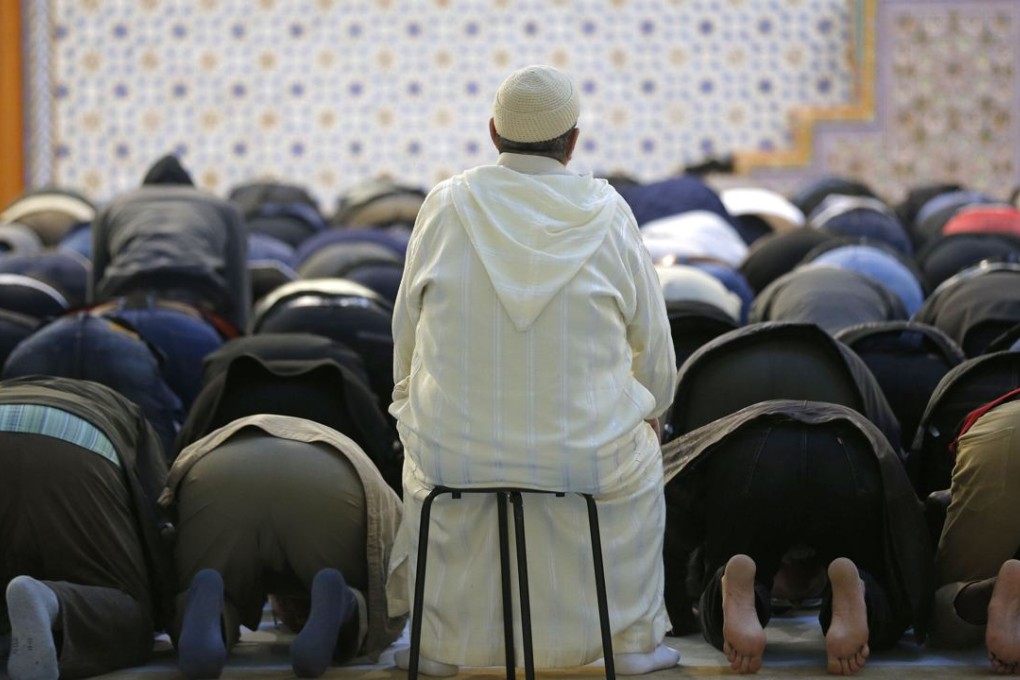Members of the Muslim community attend the Friday prayer service at Strasbourg Mosque in France, one week after the deadly attacks in Paris. Photo: Reuters