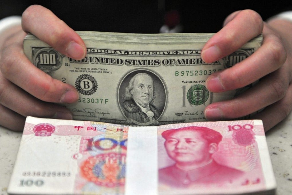 The yuan joins an elite group of currencies including the US dollar as part of holdings in the currency reserve basket of the IMF. Photo: EPA