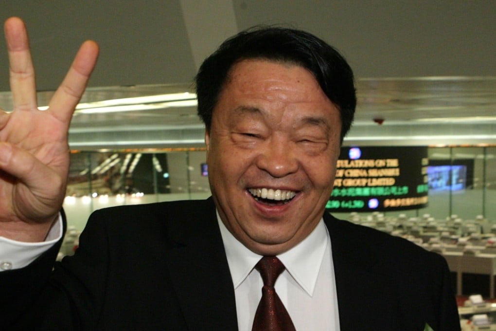 Zhang Caikui, Chairman, China Shanshui Cement Group Limited, flashes the V sign in happier times at the listing debut of the group in Hong Kong in 2008. Photo: Edward Wong