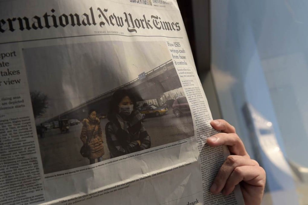 The Asian edition of the International New York Times carrying a blank space on its front page after its printer removed a piece, declining to run an article. Photo: AFP