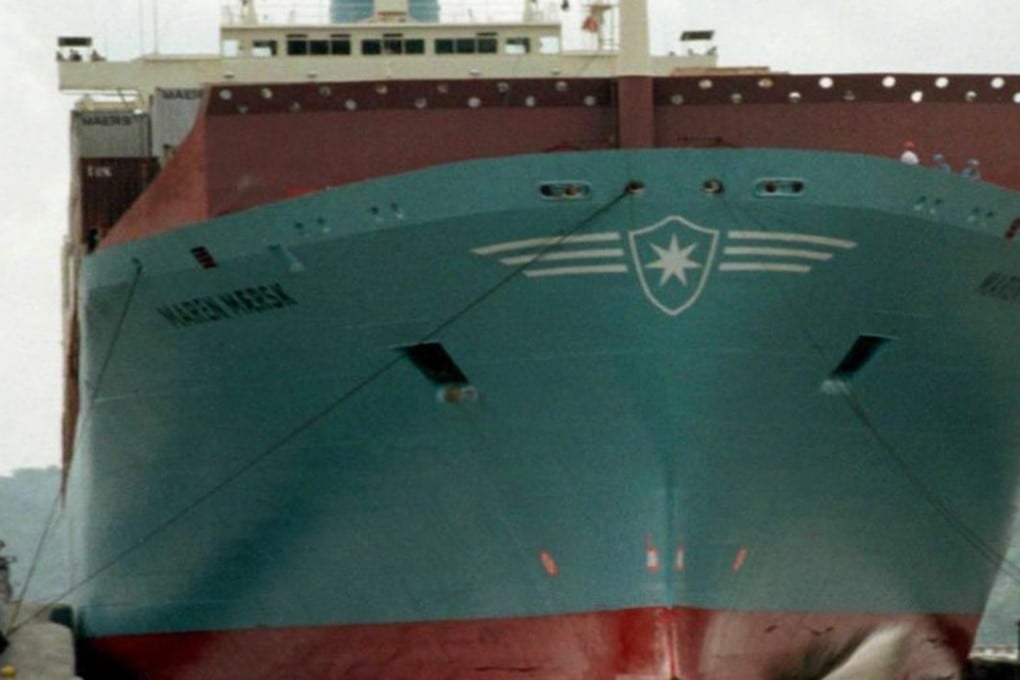 A Panamax cargo ship is brought through the Miraflores lock in Panama City as western ports upgrade their facilities from the UK to the US to accomodate ever bigger container vessels. Photo: AFP