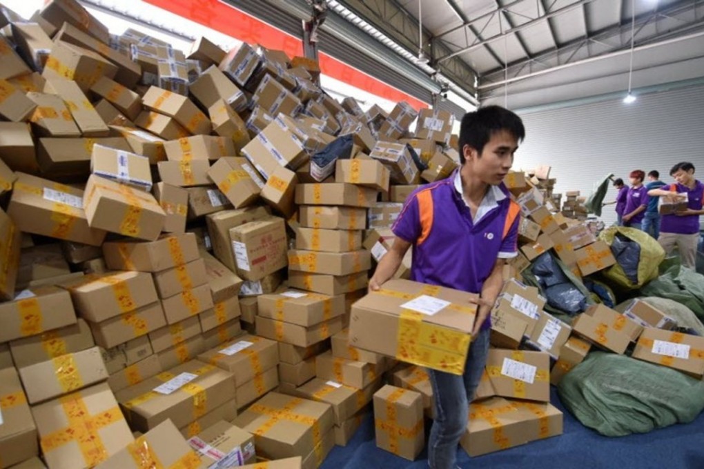 Warehouse staff sorting parcels for Black Friday. Photo: Xinhua