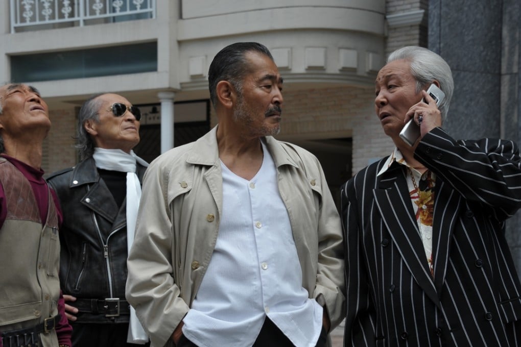 Tatsuya Fuji (second from right) and Masaomi Kondo (right) star in Ryuzo and His Seven Henchmen. The film (Category IIA) is directed by Takeshi Kitano.