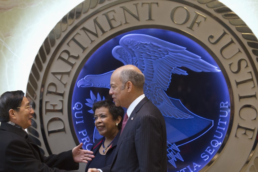 Chinese Minister of Public Security Guo Shengkun is greeted by Attorney General Loretta Lynch and Homeland Security Secretary Jeh Johnson in Washington. Photo: AP