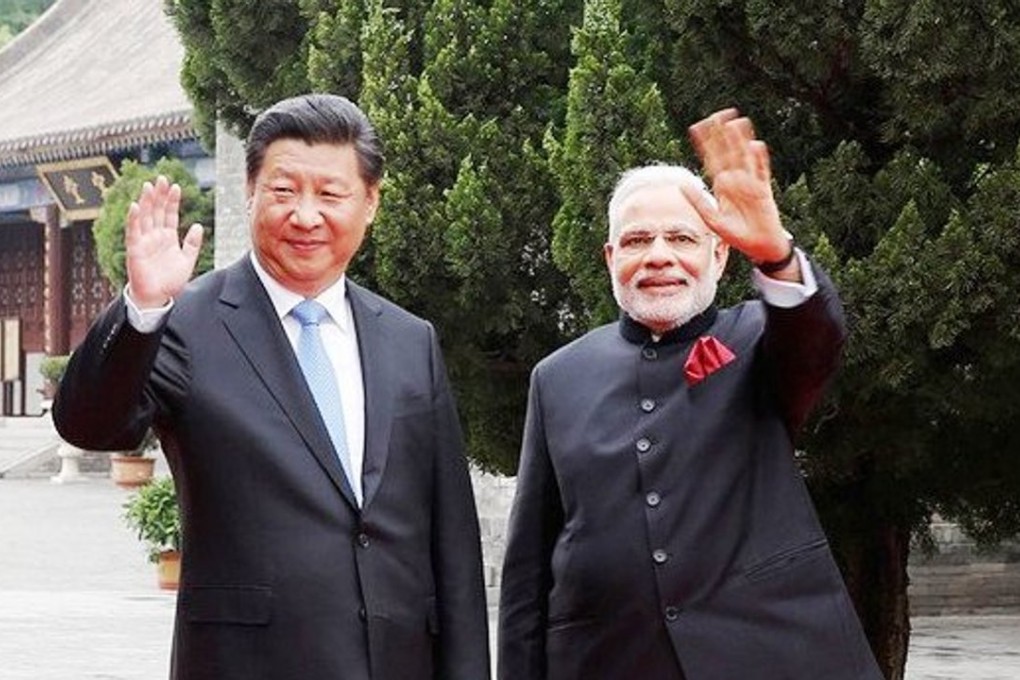 Xi Jinping and Narendra Mody today have diverging views on economic development and climate change. Photo: Chinanews.com