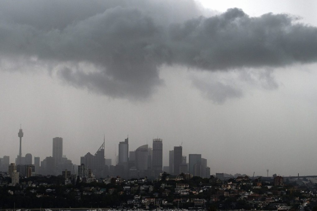 Storm clouds gather over Sydney. Photo: EPA