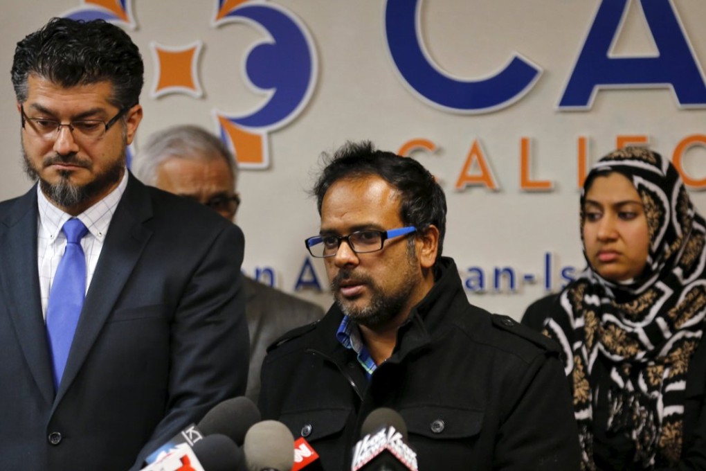 Farhan Khan (centre), brother-in-law of San Bernardino shooting suspect Syed Farook, speaks at the Council on American-Islamic Relations. Photo: Reuters