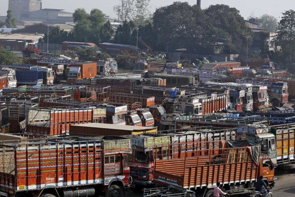 Ranks of trucks are parked on the outskirts of Ahmedabad, India, on Wednesday. Ageing commercial vehicles are big contributors to urban pollution in the sub-continent. Photo: Reuters