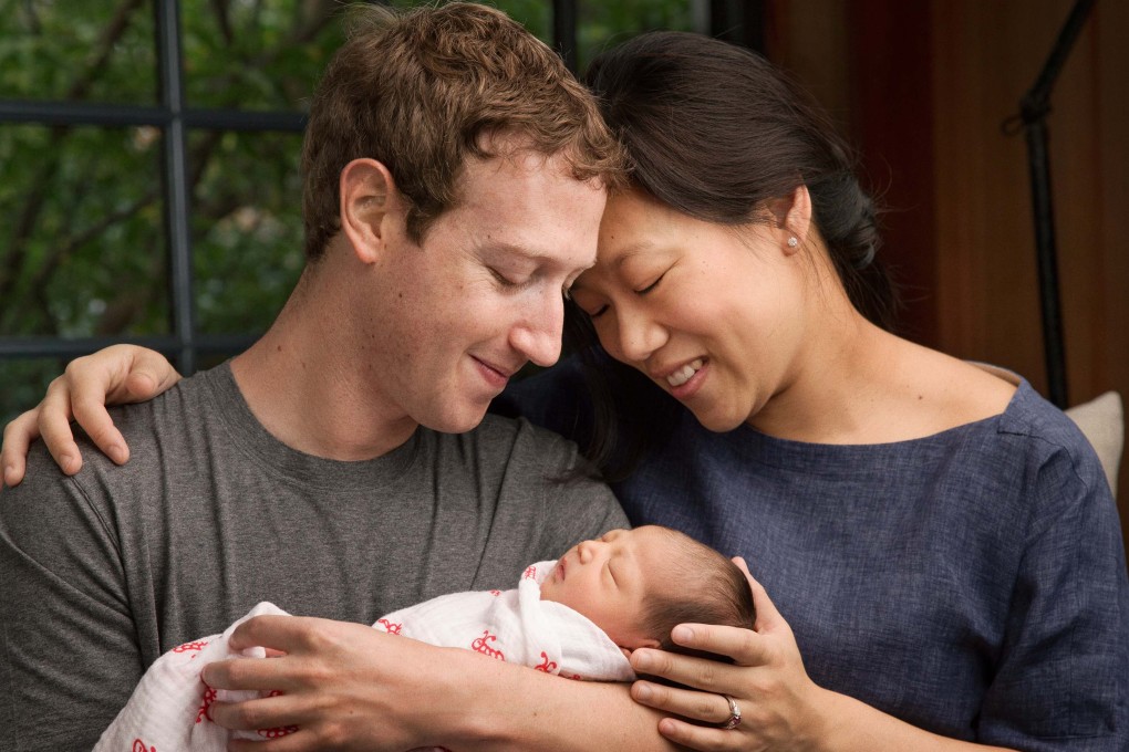 Facebook boss Mark Zuckerberg and his wife Priscilla Chan with their newborn daughter, Max. Photo: Reuters