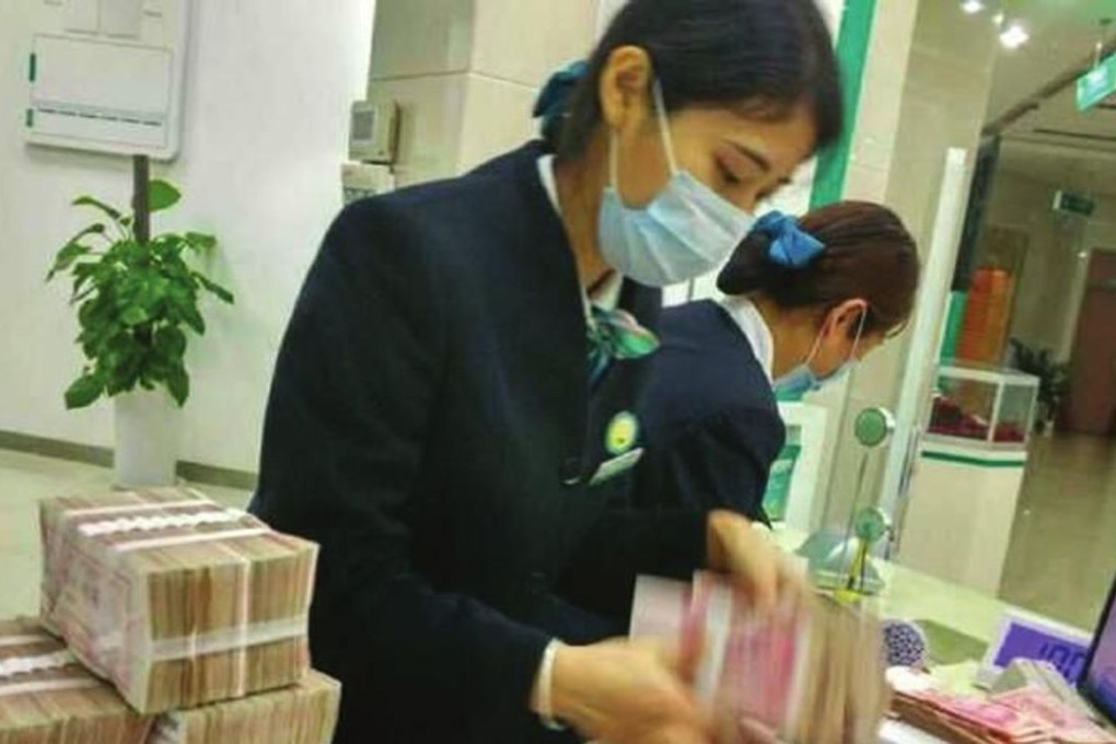 Most of the 5 million yuan consisted of damp, mouldy banknotes. Photo: SCMP Pictures