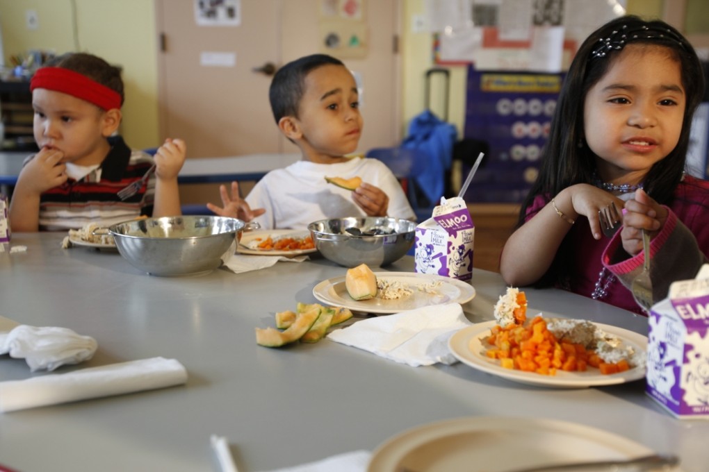 Schools can only do so much, so it is down to parents to guide and monitor what their children eat. Photo: Corbis