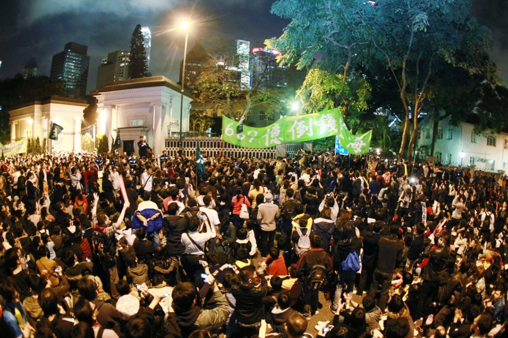 A crowd outside Government House protesting against the express rail link in 2010. Today, fears are growing that a joint immigration checkpoint may open the door to mainland law enforcement or even arrest of Hong Kong citizens – in Hong Kong, by mainland officials. Photo: K. Y. Cheng