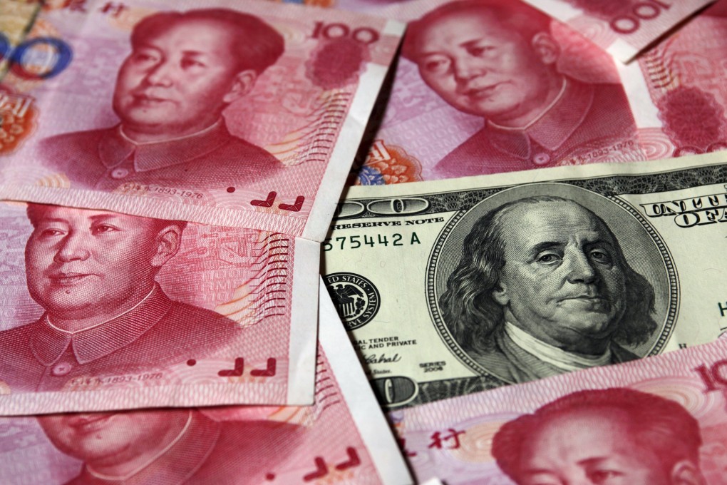 A U.S. $100 banknote is placed next to 100 yuan banknotes in this October 16, 2010 file illustration picture taken in Beijing. China's yuan may enter the International Monetary Fund's benchmark currency basket at a lower weighting than previously estimated as the IMF considers rejigging the basket to better reflect financial flows, people briefed on the Fund's discussions told Reuters. IMF policymakers are expected to add the Chinese currency to the Special Drawing Rights basket in late November 2015, after a campaign by Beijing for the yuan, or renminbi, to have equal billing with the dollar, euro, pound sterling and yen. REUTERS/Petar Kujundzic/Files