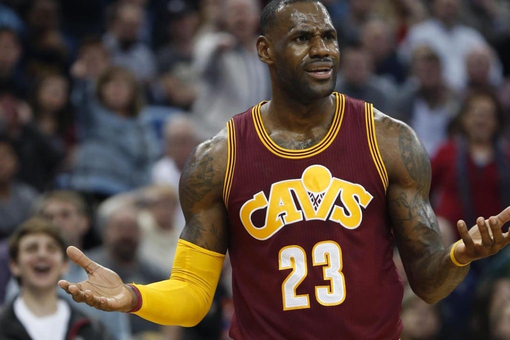 Cleveland Cavaliers forward LeBron James (23) reacts after being called for an offensive foul in the first half of an NBA basketball game against the New Orleans Pelicans in New Orleans, Friday, Dec. 4, 2015. (AP Photo/Gerald Herbert)