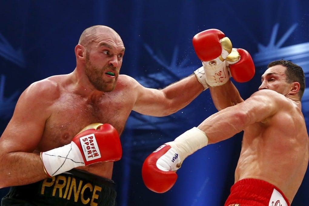 Tyson Fury on his way to victory over Wladimir Klitschko in their WBA, IBF and WBO heavyweight title fight. Photo: Reuters