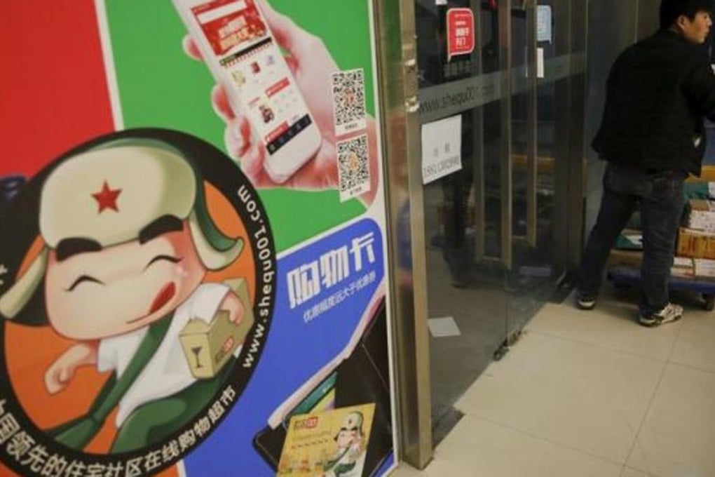 A delivery man stops in front of the Beijing offices of Shequ001, a start-up company delivering supermarket goods booked via smartphone, on Monday. Photo: Reuters