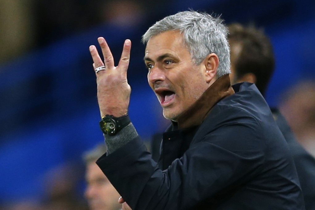 Jose Mourinho issues instructions to his players. Photo: Reuters