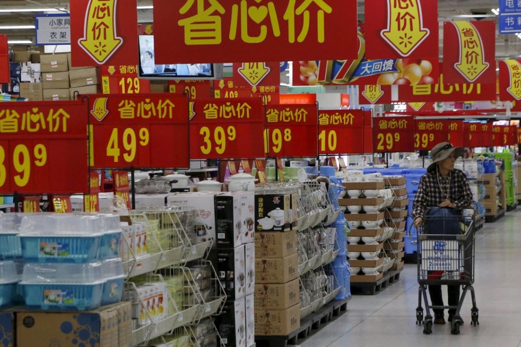 A woman shops at a supermarket in Beijing. Photo: Reuters