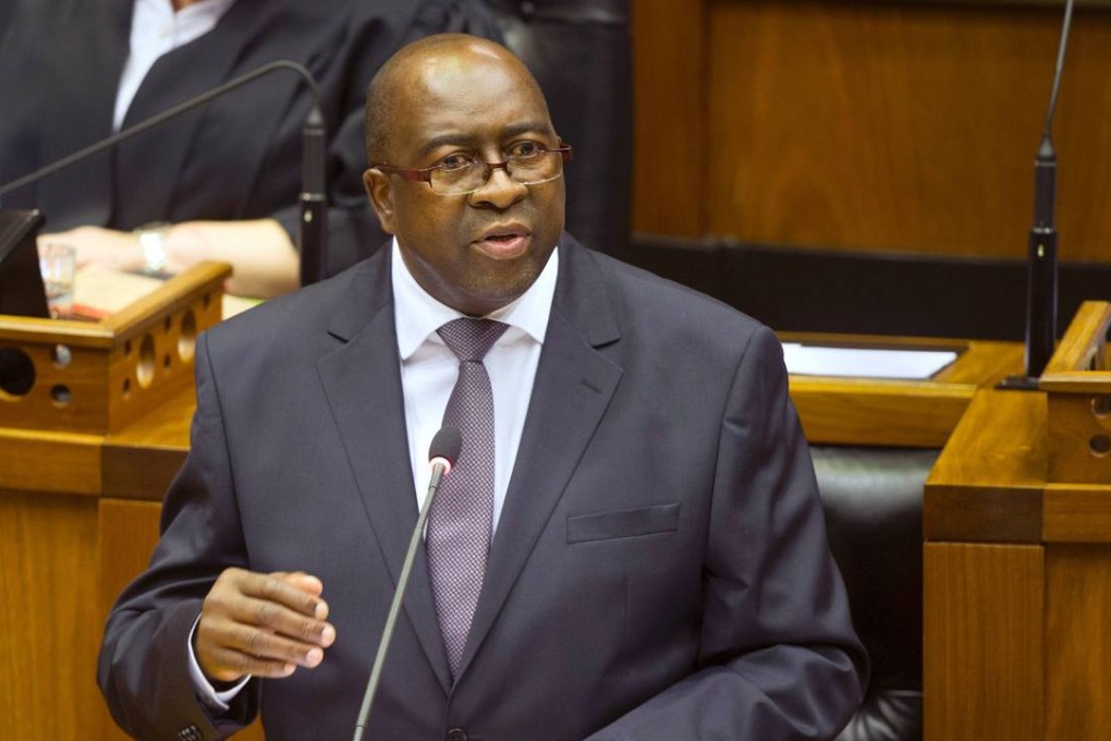 South African Minister of Finance Nhlanhla Nene delivers the 2015 Budget Speech at the National Assembly in Cape Town in February. His removal by President Jacob Zuma has been poorly received. Photo: AFP