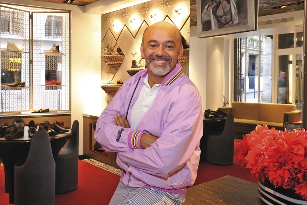 Designer Christian Louboutin in his Paris men’s flagship store. Photo: Corbis