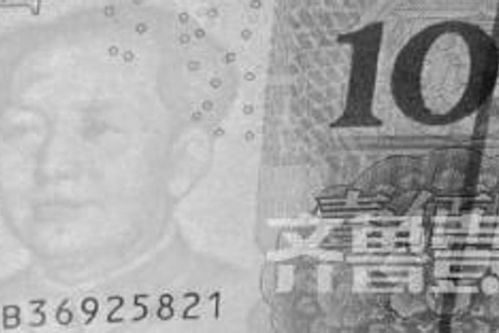 The genuine Chinese 100-yuan banknote with the watermark image of Mao Zedong that has two left eyebrows. Photo: Qilu Evening News