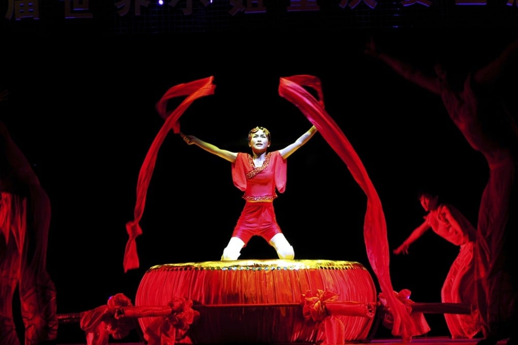 Liao Zhi returned to the stage just two months after losing her legs in 2008. Photo: Corbis