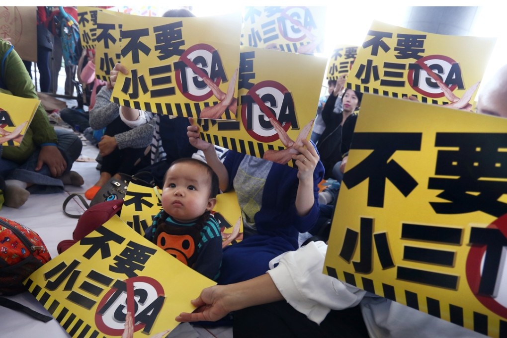 Parents and other concern groups staging a protest last month against TSA tests for Primary Three students, outside the Legislative Council building. Photo: Jonathan Wong