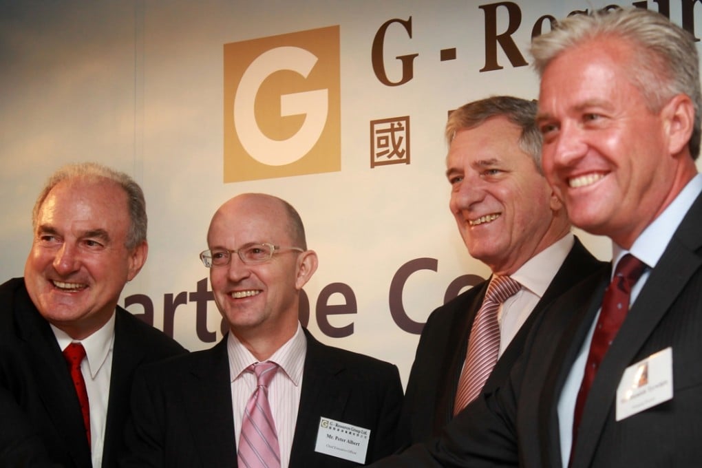 A 2010 file photo of (from left) G-Resources’ Executive Director Owen Hegarty, and G-Resources’ Vice Chairman Peter Albert. Also depicted in the photo (from right) are Leighton Asia’s Managing Director Hamish Tyrwhitt, and Leighton Asia’s President Director Ray Hodgson. Photo: Felix Wong, SCMP