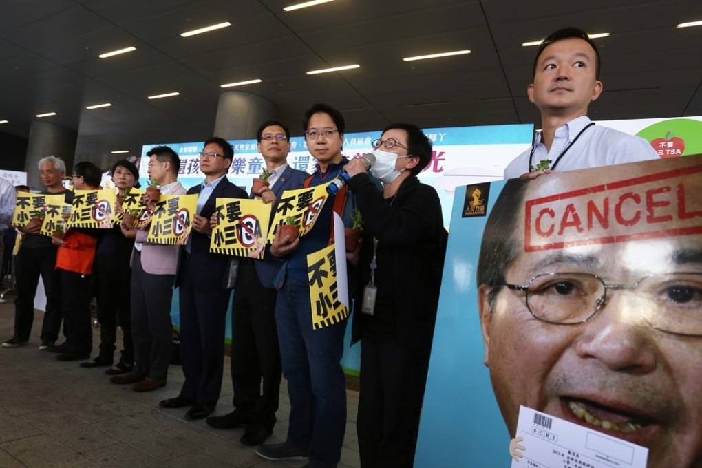 Lawmakers hold placards protesting against the Territory-wide System Assessment outside the Legco Building in Tamar last month. Photo: Jonathan Wong