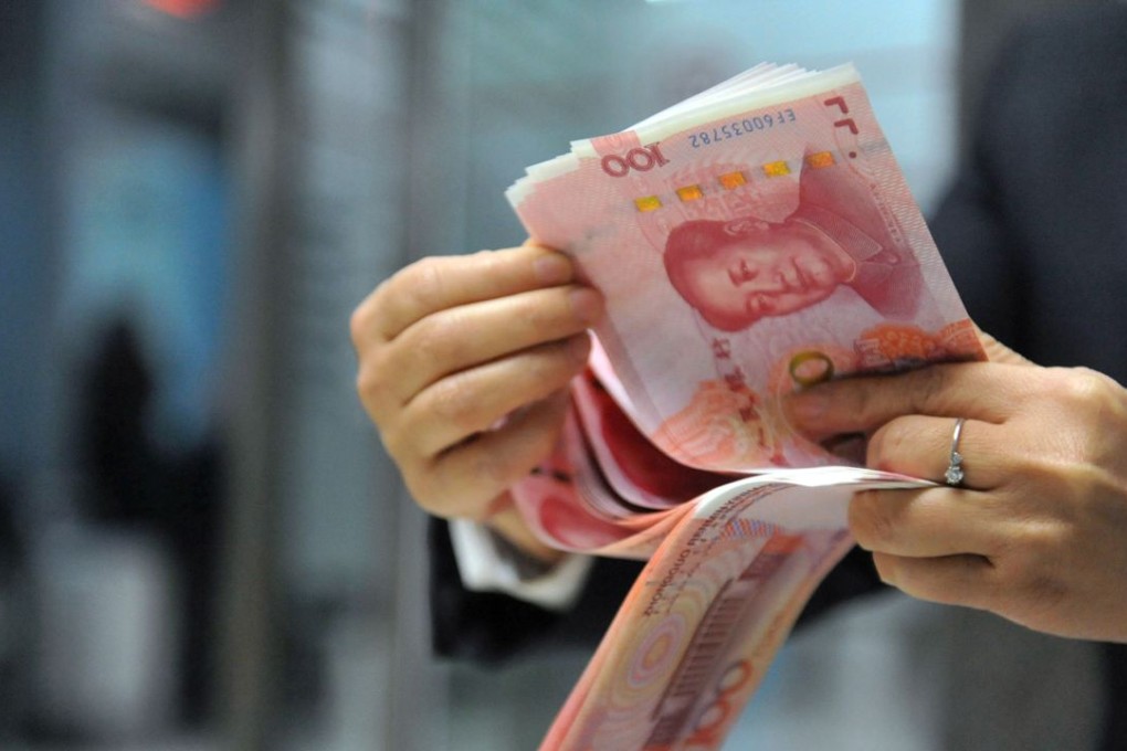 The onshore yuan ended down 175 basis points on Friday, or 6.4553 against the dollar, while the offshore yuan touched 6.5322. Photo: AFP