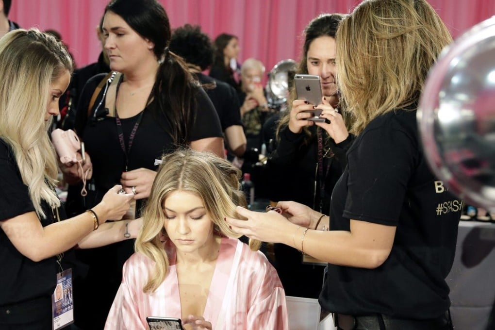 Gigi Hadid backstage at a fashion show. Photo: EPA