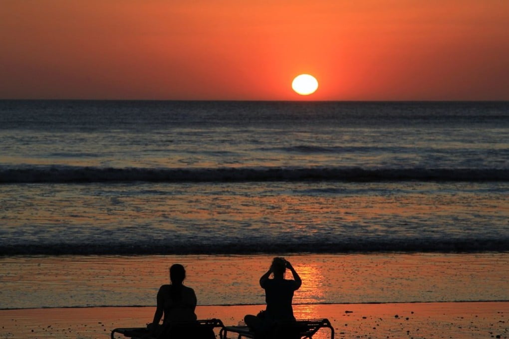 Sunbathers will have an extra five milliseconds a day to top up their tan as climate change slows down Earth’s rotation, according to researchers at Harvard University. Photo: Reuters
