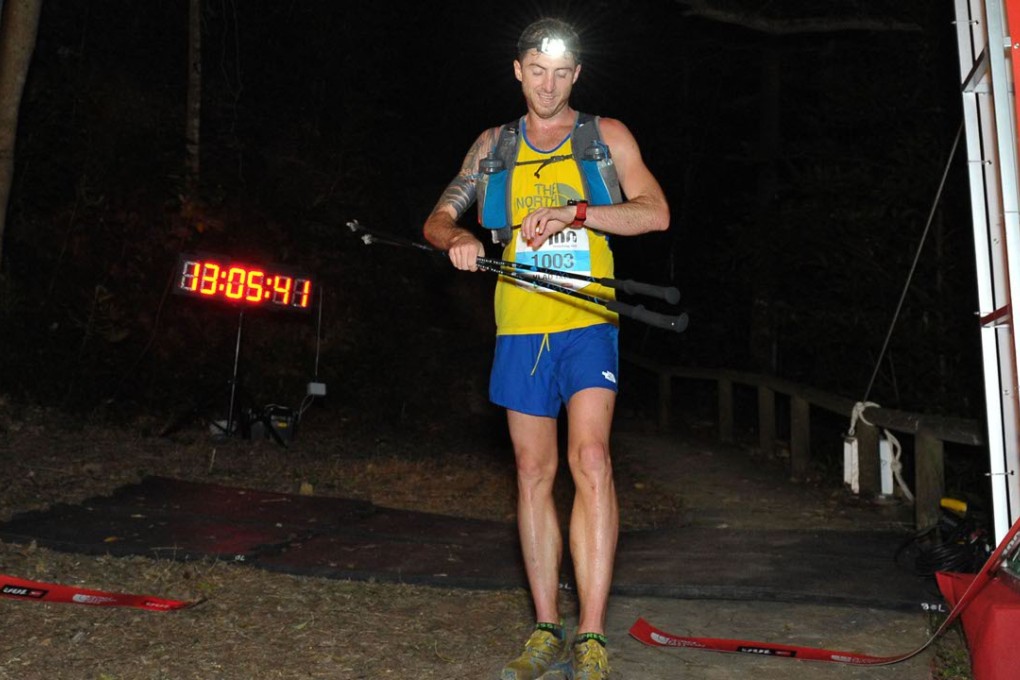 Vlad Ixel crosses the finish line to claim honours in the men’s section of the North Face 100 Hong Kong 100km race. Photos: SCMP Pictures