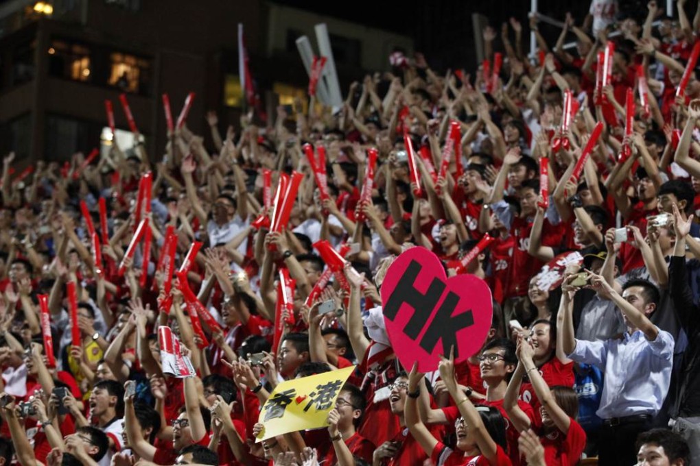 Hong Kong soccer fans at the World Cup qualifying match against China. Many endured the frustration of buying tickets via Cityline. Photo: AFP