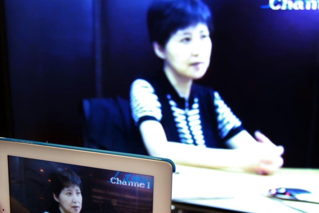 Gu Kailai testifies during the trial of her husband Xilai. Photo: Simon Song