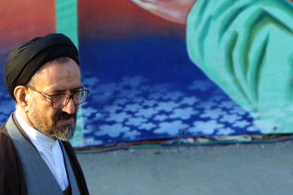 Mahmoud Doaei, managing editor of the Ettela'at newspaper, is seen in 2002. Doaei has defied hardliners by running a photo of reformist ex-president Mohammad Khatami. Photo: AFP