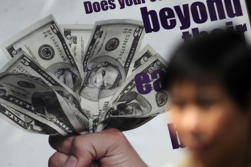 Hong Kong’s 32-year-old peg to the US dollar virtually imports monetary policy from the United States. Photo: AFP