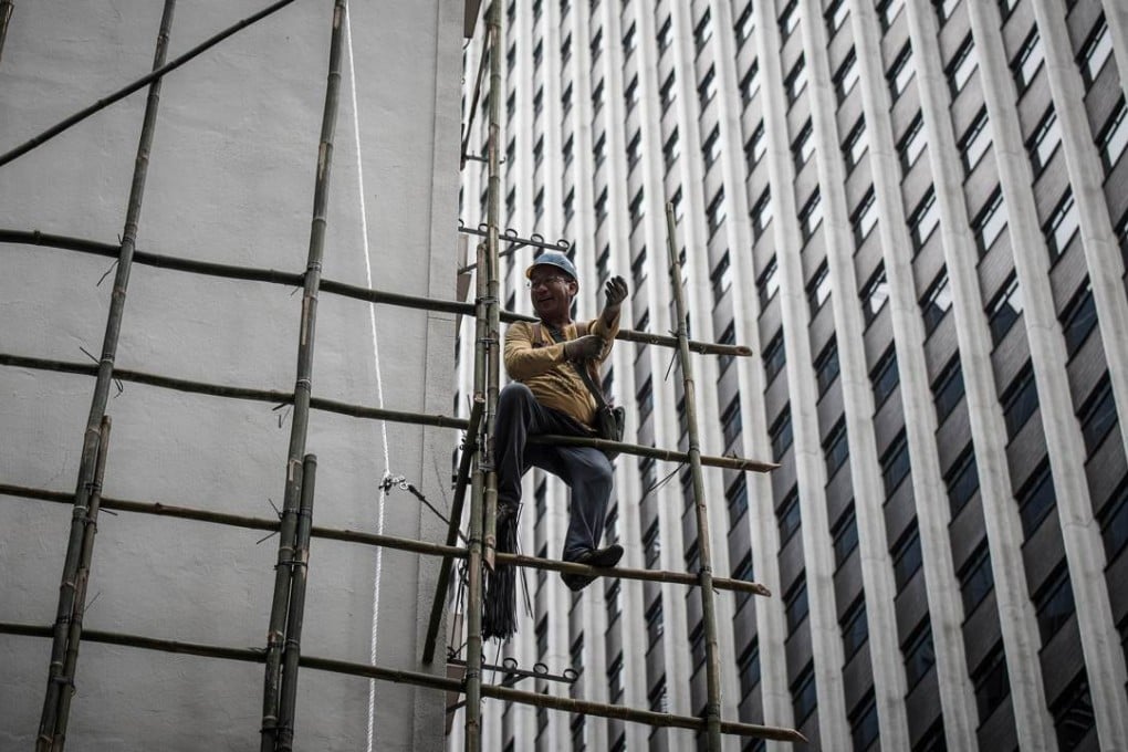 Capitalists and workers need each other for an economy to function properly. Hong Kong’s success relies on its people. Photo: AFP