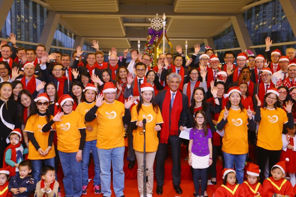 The Morgan Stanley Directors’ Choir is led by Asia-Pacific co-CEO Gokul Laroia (front row, centre). Photo: Edmond So