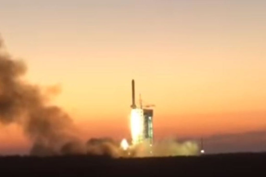 This screengrab from a video posted on YouTube by People’s Daily shows the Dark Matter Particle Explorer (DAMPE) launching from the Jiuquan Satellite Launch Centre in Inner Mongolia on Thursday morning. Photo: SCMP Pictures