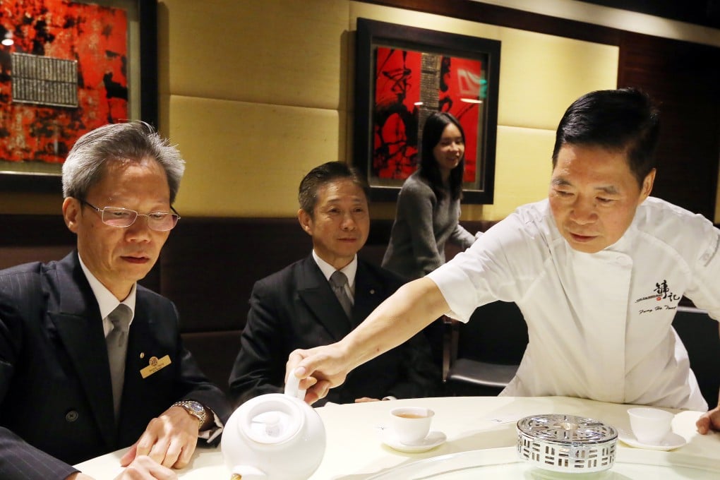 Yung Kee wine manager Derrick Chung (left), sales manager Peter Sham Wah and chef Fung Ho-tong have tea at the restaurant. Photo: Felix Wong