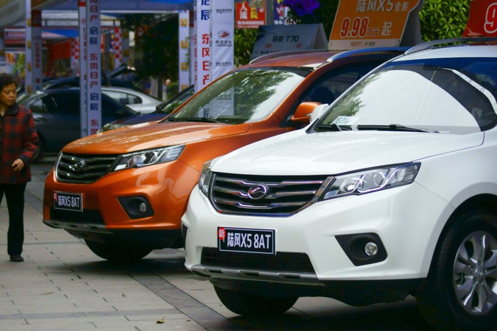 There were 2.02 million passenger vehicles purchased on the mainland last month, up 18 per cent year on year. Photo: Reuters