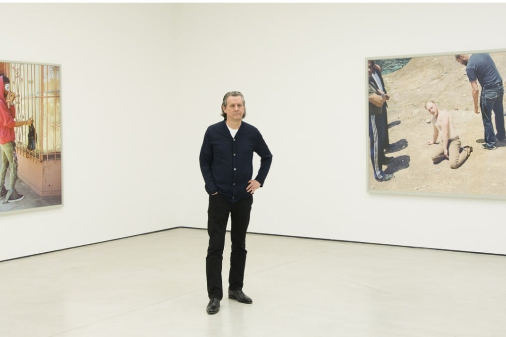 Jeff Wall with two of his works on display in Hong Kong.